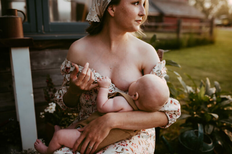 Mother breastfeeding her young baby