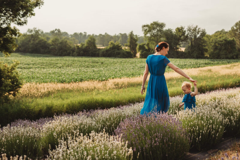 Mother and daughter dancing in a field of lavender at Christel Lake Lavender
