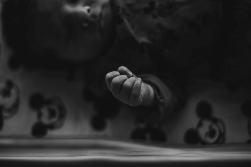 Close-up of newborn's hand during a newborn photography session in Peterborough